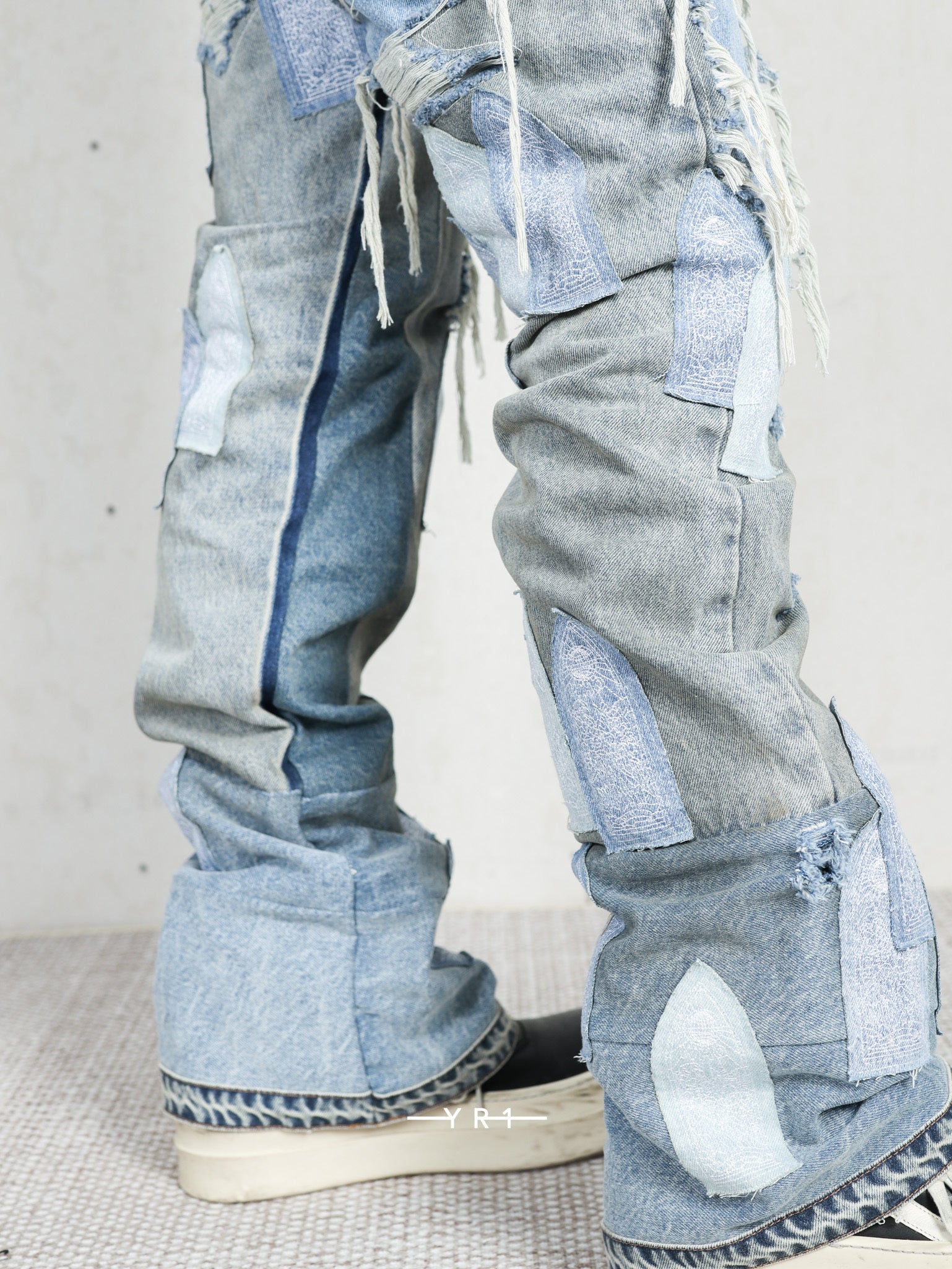 Patched Arch Repaired Blowout Denim