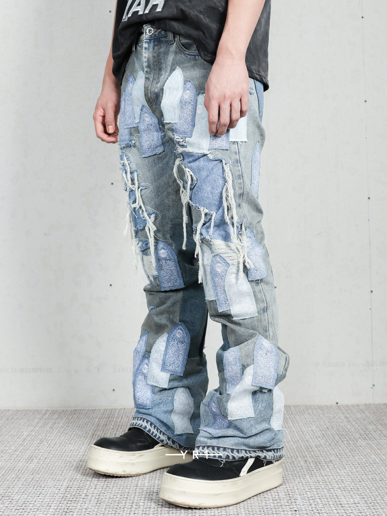 Patched Arch Repaired Blowout Denim