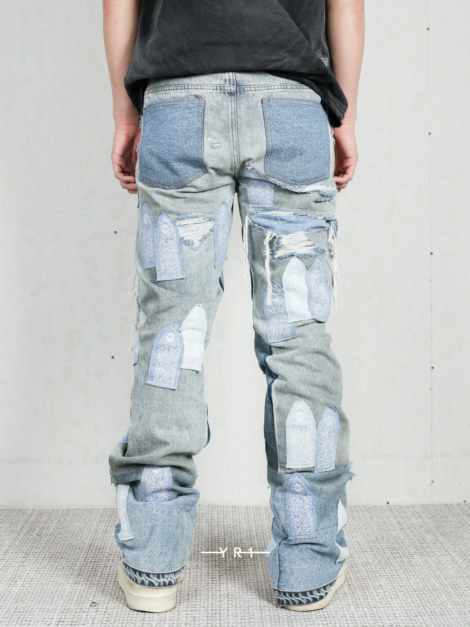 Patched Arch Repaired Blowout Denim